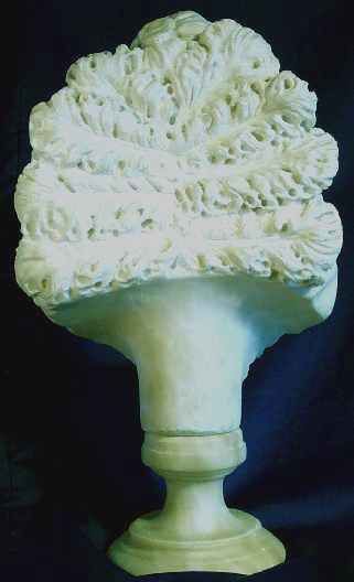 Alabaster Bust of a Woman Atop a Peacock  
