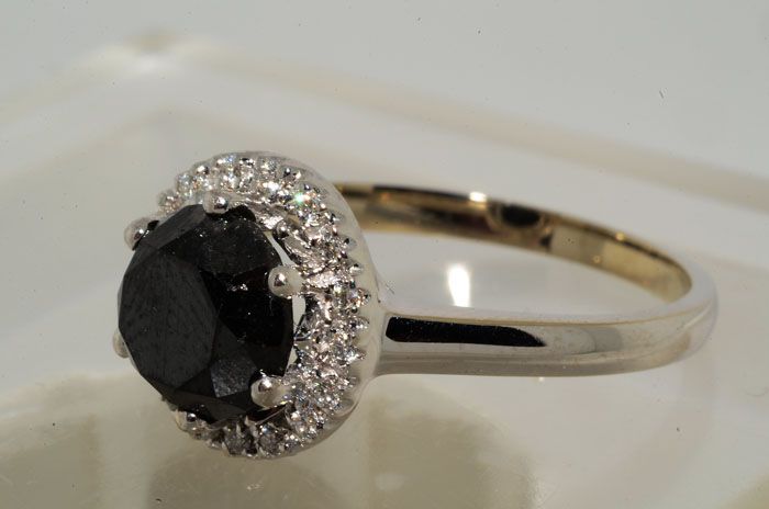   black diamond 2 36cts color black clarity n a total of stones 1 cut