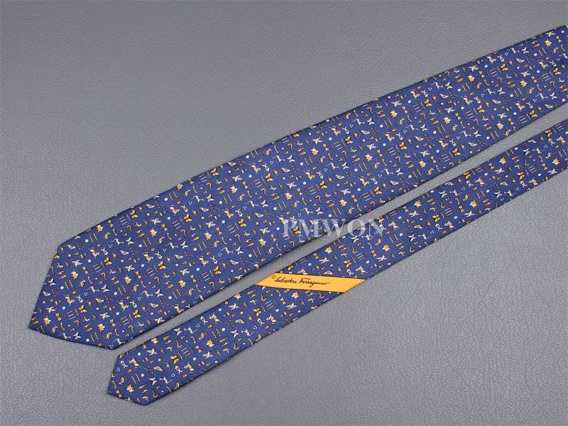 SALVATORE FERRAGAMO TIE Animal Egyptian Script on Navy Blue Silk 