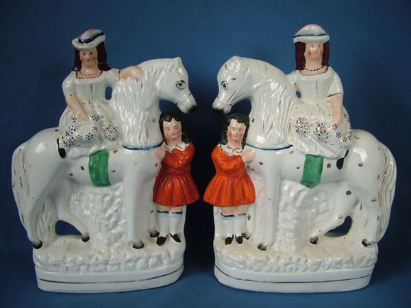 Pair Staffordshire lady & girl on horseback figure  