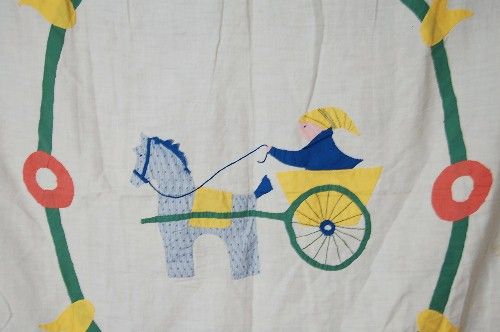   hand embroidered accents. The horse even has a little ruffle mane