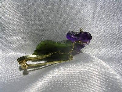   hand made unique carved gemstone brooch in excellent condition