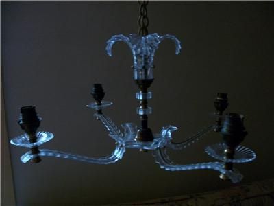 This gorgeous frou frou 4 arm light fitting was made in France in 