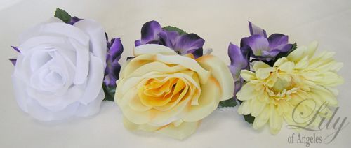 rose accented with purple hydrangeas and decorated with purple bow