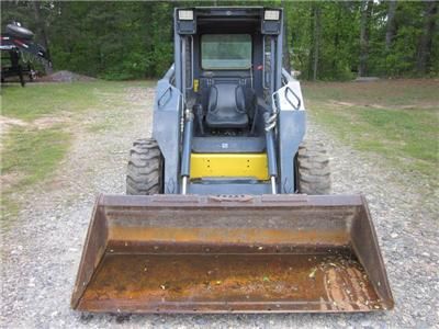 NEW HOLLAND LS180, SMOOTH BUCKET, GOOD TIRES, SKID STEER LOADER  