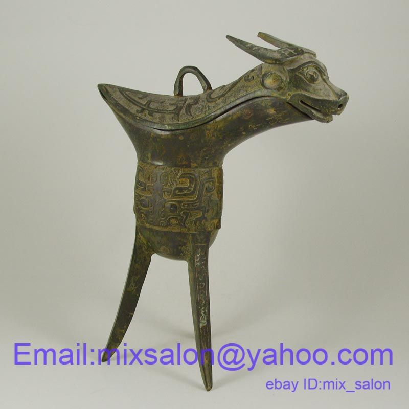   Chinese Bronze Jue Tripod Cup Bull Head Vessel With Beast Design